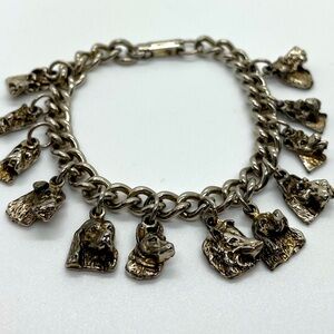 VTG silver tone charm bracelet w/ 12 dog breed charms